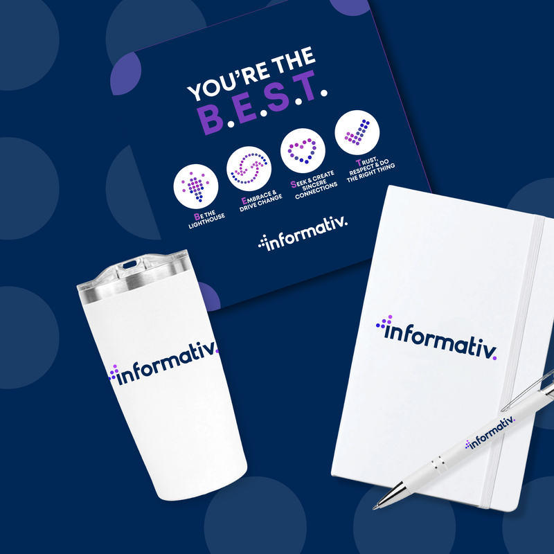 Branded swag flat lay: a card, tumbler, notebook and pen carrying the informativ values, be the lighthouse, embrace and drive change, seek and create sincere connections, trust, respect and do the right thing